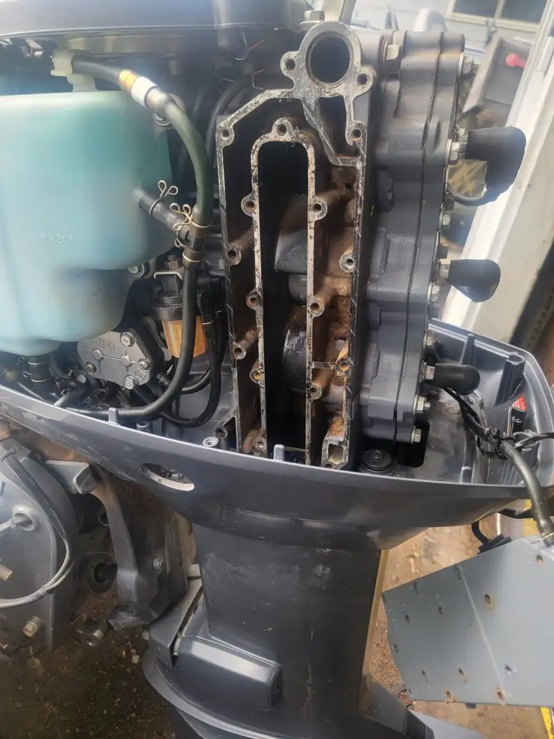 Honda four-stroke outboard with the cowling off.