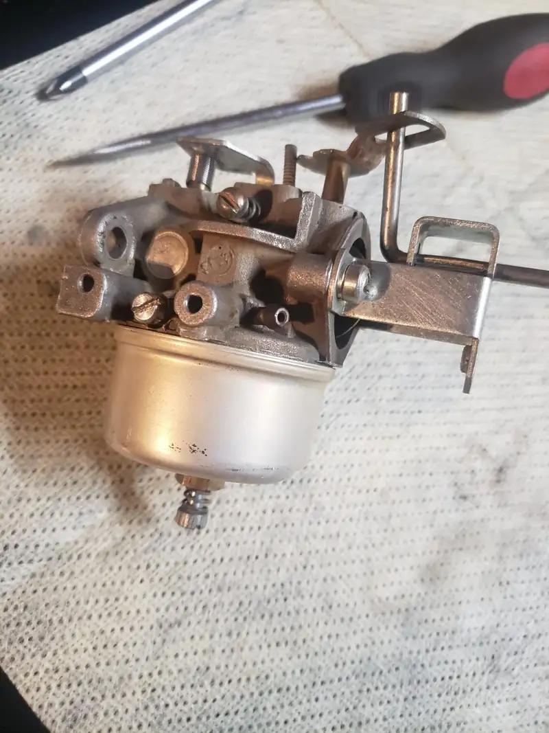 A cleaned carburetor on a towel.